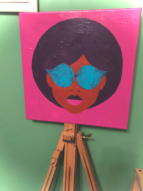 Retro lady on a pink background with sunglasses on