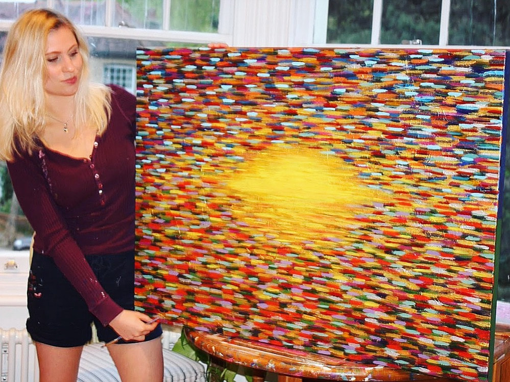 Krissie with large sunset painting