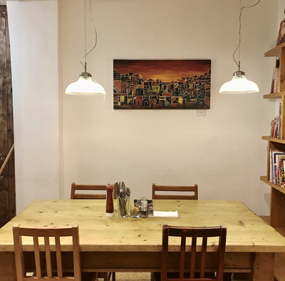 'Village' painting up in a restaurant