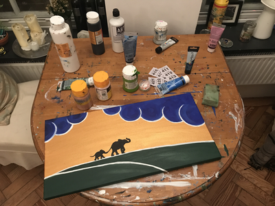 Painting of elephants on a horizon at sunset